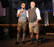 Moderator Goofy Förster, Dr. Axel Munz von Trachten Angermaier {©Foto: Martin Schmitz)